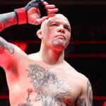 Anthony Smith (red gloves) prepares to fight Zhang Mingyang (not pictured) during UFC Fight Night at T-Mobile Center.