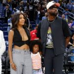 Former basketball player Dwyane Wade attends with his wife Gabrielle Union a WNBA game between the Chicago Sky and Connecticut Sun at Wintrust Arena.