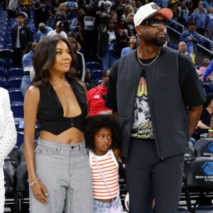 Former basketball player Dwyane Wade attends with his wife Gabrielle Union a WNBA game between the Chicago Sky and Connecticut Sun at Wintrust Arena.