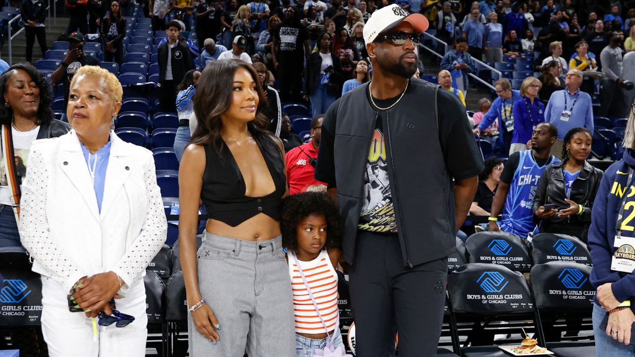 Former basketball player Dwyane Wade attends with his wife Gabrielle Union a WNBA game between the Chicago Sky and Connecticut Sun at Wintrust Arena.