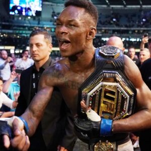 Israel Adesanya of New Zealand celebrates his win against Robert Whittaker of Australia during UFC 243