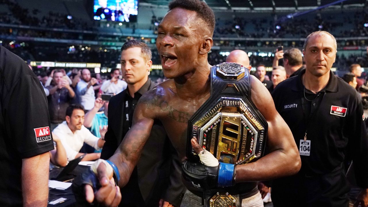 Israel Adesanya of New Zealand celebrates his win against Robert Whittaker of Australia during UFC 243