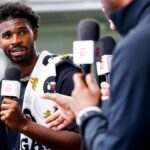 Colorado Buffaloes quarterback Shedeur Sanders (2) talks to ESPN after the University of Colorado NFL Showcase at the CU Indoor Practice Facility.