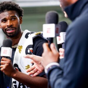 Colorado Buffaloes quarterback Shedeur Sanders (2) talks to ESPN after the University of Colorado NFL Showcase at the CU Indoor Practice Facility.