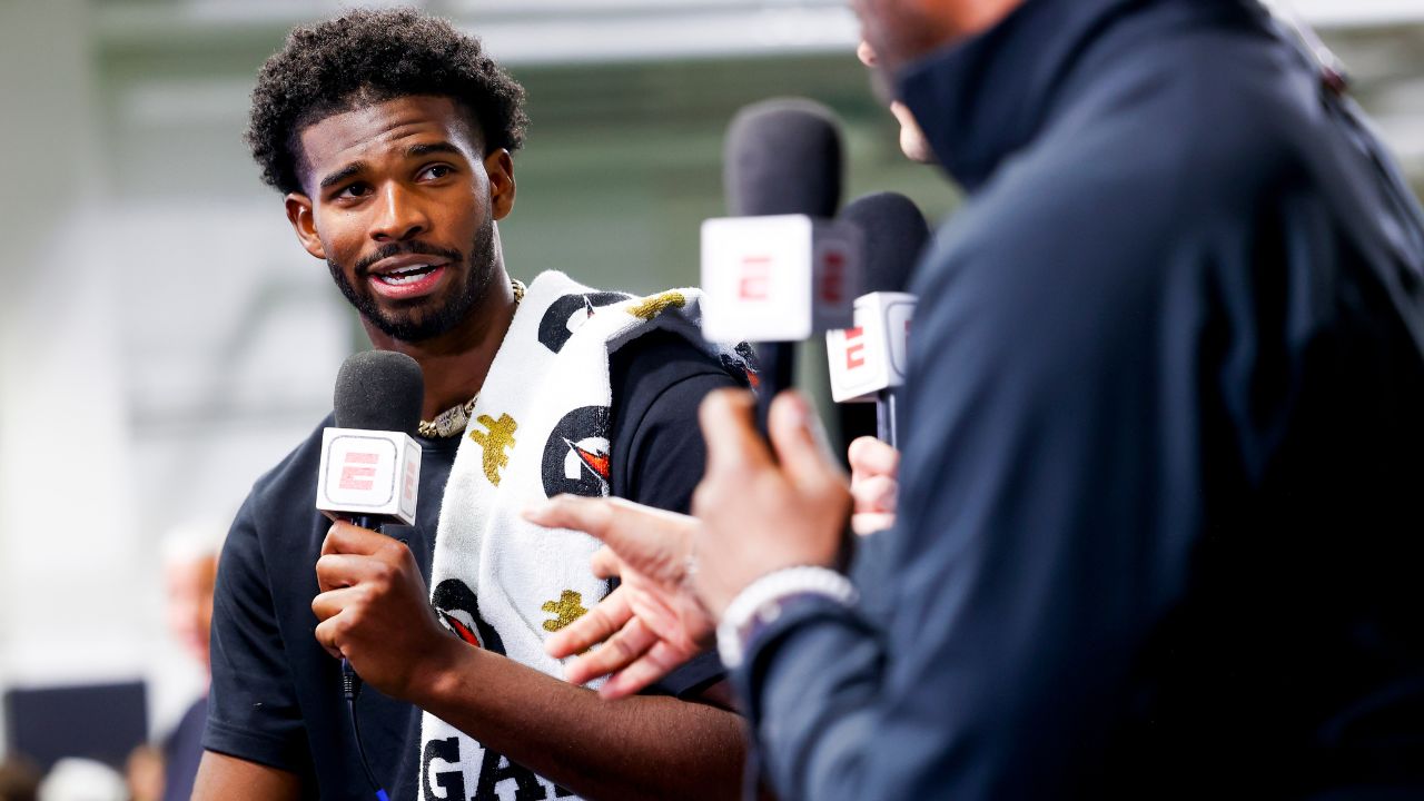 Colorado Buffaloes quarterback Shedeur Sanders (2) talks to ESPN after the University of Colorado NFL Showcase at the CU Indoor Practice Facility.