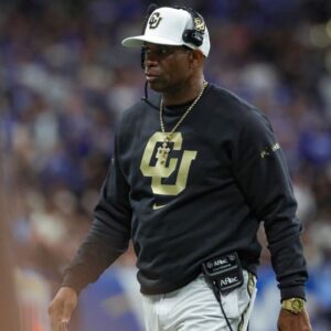 Dec 28, 2024; San Antonio, TX, USA; Colorado Buffaloes head coach Deion Sanders walks on the field during the game against the Brigham Young Cougars at Alamodome.