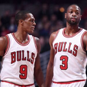 Chicago Bulls guard Rajon Rondo (9) talks with guard Dwyane Wade (3) during the first half against the Washington Wizards at the United Center.