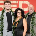 Michigan Wolverines defensive lineman Mason Graham with his parents Allen Graham and Kimberly Graham on the red carpet before the 2025 NFL Draft at Lambeau Field.