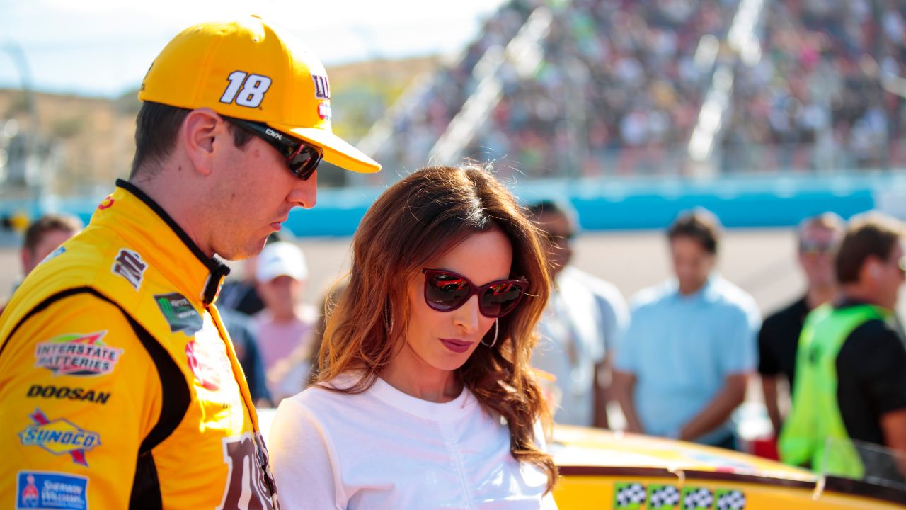 NASCAR Cup Series driver Kyle Busch (left) and wife Samantha Busch during the Bluegreen Vacations 500 at ISM Raceway.