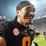 Tennessee quarterback Nico Iamaleava (8) walks off the field after the win over Kentucky after an NCAA college football game on Saturday.
