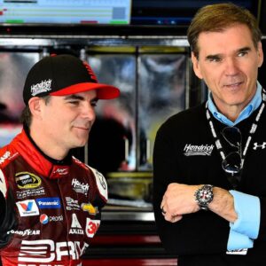 Jeff Gordon talks to with his former crew chief Ray Evernham during practice for the Daytona 500 at Daytona International Speedway.