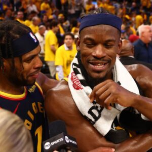 Golden State Warriors guard Buddy Hield (7) celebrates with forward Jimmy Butler III (10) as he speaks to TNT after the game four of the 2025 NBA Playoffs first round against the Houston Rockets at Chase Center.