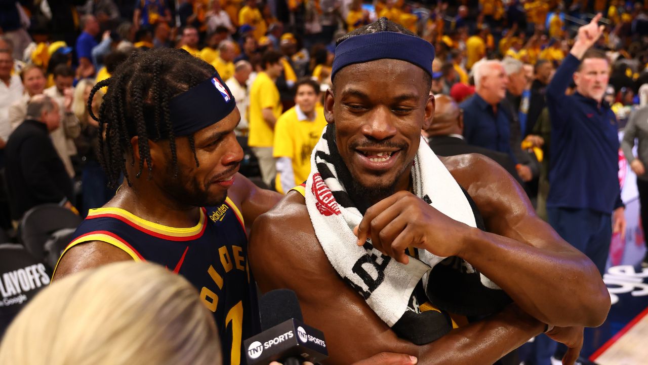 Golden State Warriors guard Buddy Hield (7) celebrates with forward Jimmy Butler III (10) as he speaks to TNT after the game four of the 2025 NBA Playoffs first round against the Houston Rockets at Chase Center.