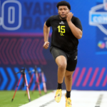 Oregon defensive lineman Derrick Harmon (DL15) participates in drills during the 2025 NFL Combine at Lucas Oil Stadium.
