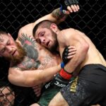 ; Khabib Nurmagomedov (red gloves) fights Conor McGregor (blue gloves) during UFC 229 at T-Mobile Arena.