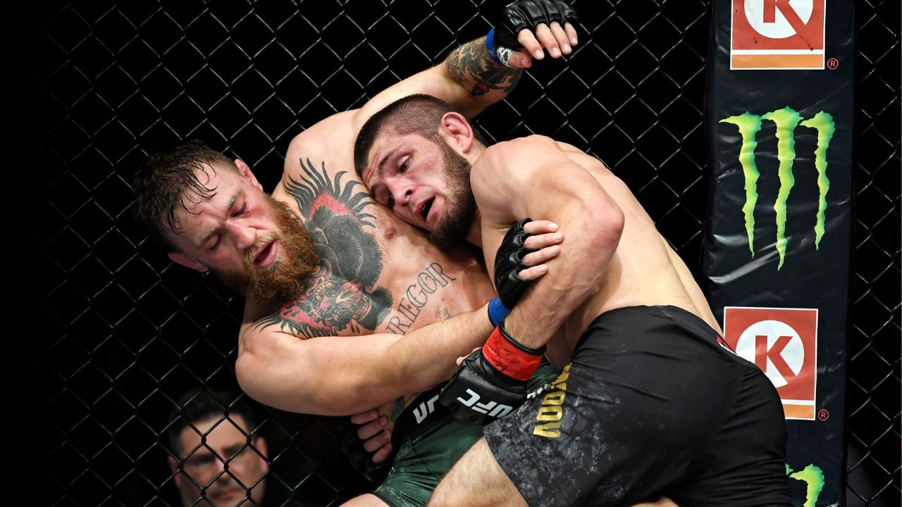 ; Khabib Nurmagomedov (red gloves) fights Conor McGregor (blue gloves) during UFC 229 at T-Mobile Arena.
