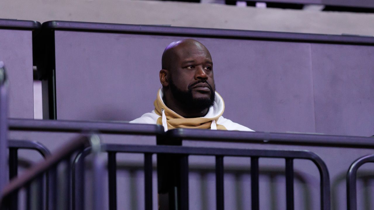 Former NBA player Shaquille O'Neal sits courtside during the first half between the Florida Gators and the LSU Tigers at Exactech Arena at the Stephen C. O'Connell Center.