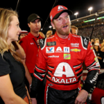Nov 19, 2017; Homestead, FL, USA; NASCAR Cup Series driver Dale Earnhardt Jr. (88) with his wife Amy Reimann after the Ford EcoBoost 400 at Homestead-Miami Speedway. Mandatory Credit: Peter Casey-Imagn Images