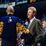 Indiana Pacers head coach Larry Bird talks to Reggie Miller (left) against the Miami Heat at the Miami Arena