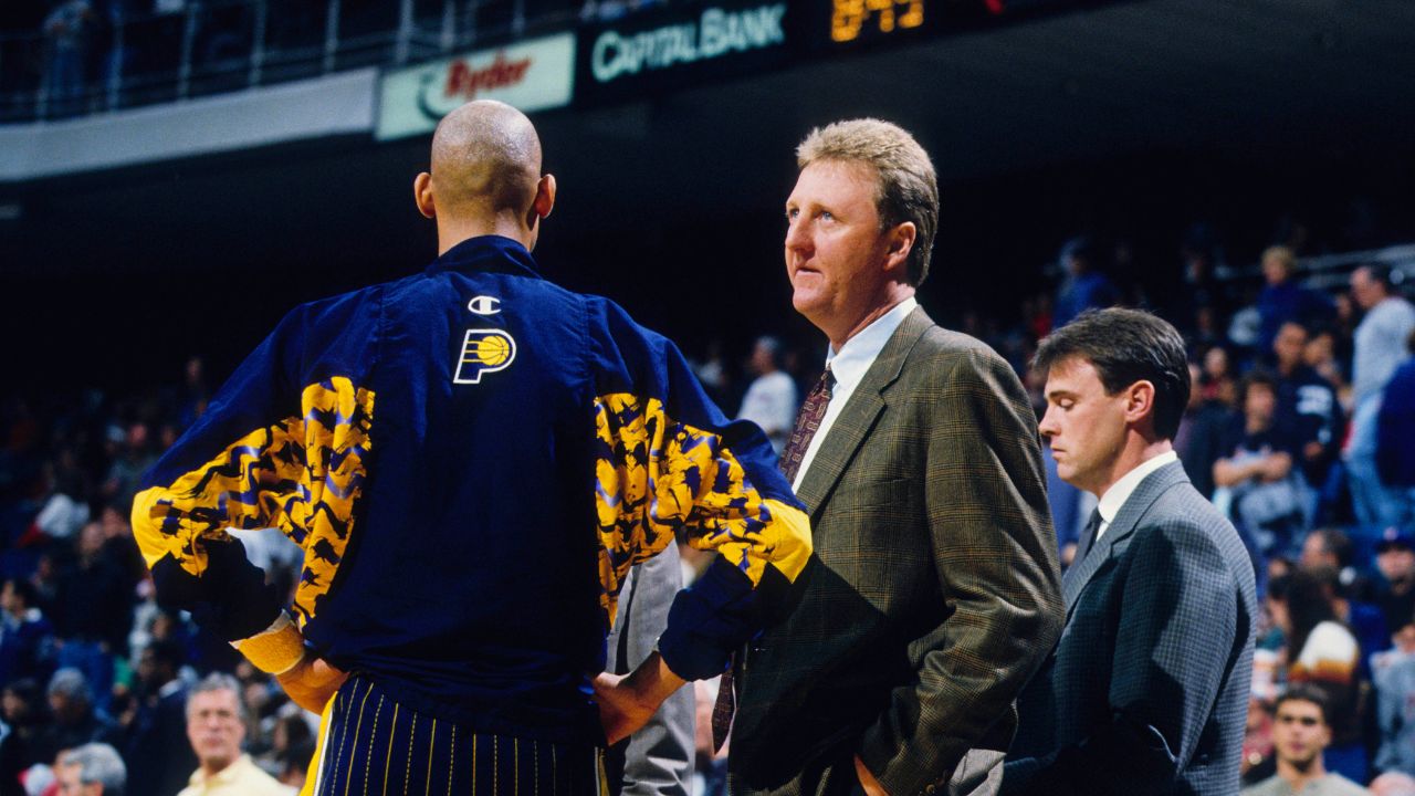 Indiana Pacers head coach Larry Bird talks to Reggie Miller (left) against the Miami Heat at the Miami Arena