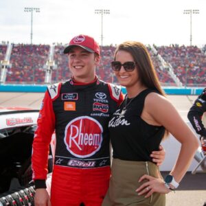 Christopher Bell (left) with fiance Morgan Kemenah during the Desert Diamond Casino West Valley 200 at ISM Raceway.