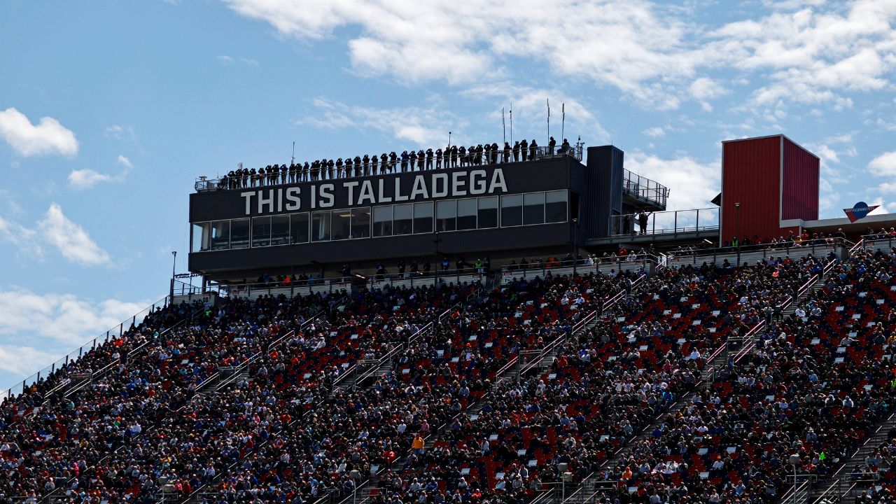 Spotters watch the race from atop the press box during the GEICO 500 at Talladega Superspeedway.
