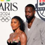 Dwyane Wade and wife Gabrielle Union pose for a photograph during the Paris 2024 Olympic Summer Games at Team USA House