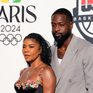 Dwyane Wade and wife Gabrielle Union pose for a photograph during the Paris 2024 Olympic Summer Games at Team USA House