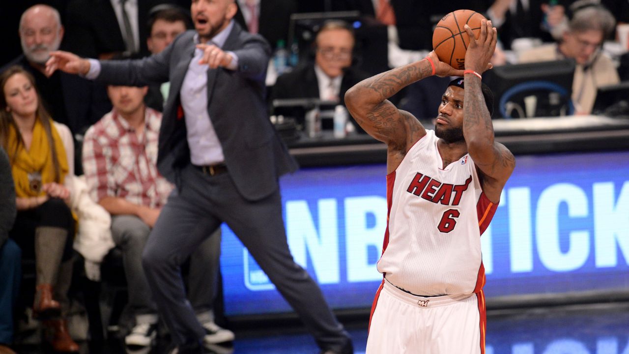 Brooklyn Nets head coach Jason Kidd reacts as Miami Heat small forward LeBron James (6) takes a shot during the second half at Barclays Center. The Brooklyn Nets won the game 104-95 in double overtime.