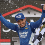 Apr 12, 2025; Bristol, Tennessee, USA; NASCAR Xfinity Series driver Kyle Larson (17) celebrates after winning the NASCAR SciAps 300 at Bristol Motor Speedway. Mandatory Credit: Randy Sartin-Imagn Images