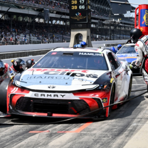 NASCAR Cup Series driver Denny Hamlin (11) makes a pit stop during the Brickyard 400, Sunday, July 21, 2024, at Indianapolis Motor Speedway.