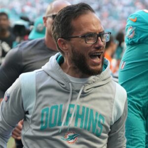 Miami Dolphins head coach Mike McDaniel is all smiles as he leaves the field after an 11-6 victory over the New York Jets at Hard Rock Stadium in Miami Gardens, Jan. 8, 2023.