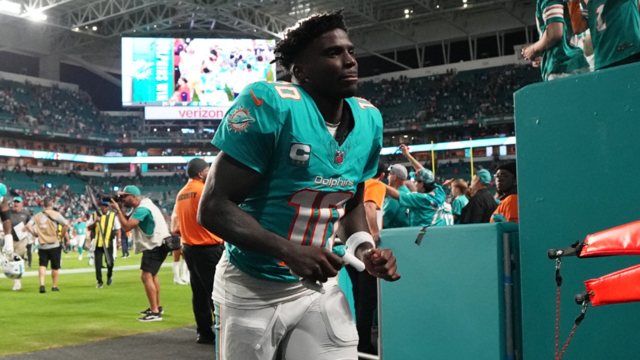 Dec 22, 2024; Miami Gardens, Florida, USA; Miami Dolphins wide receiver Tyreek Hill (10) runs off the field after defeating the San Francisco 49ers at Hard Rock Stadium.