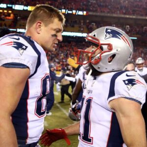 Jan 20, 2019; Kansas City, MO, USA; New England Patriots wide receiver Julian Edelman (11) celebrates with tight end Rob Gronkowski (87) after defeating the Kansas City Chiefs in overtime of the AFC Championship game at Arrowhead Stadium.