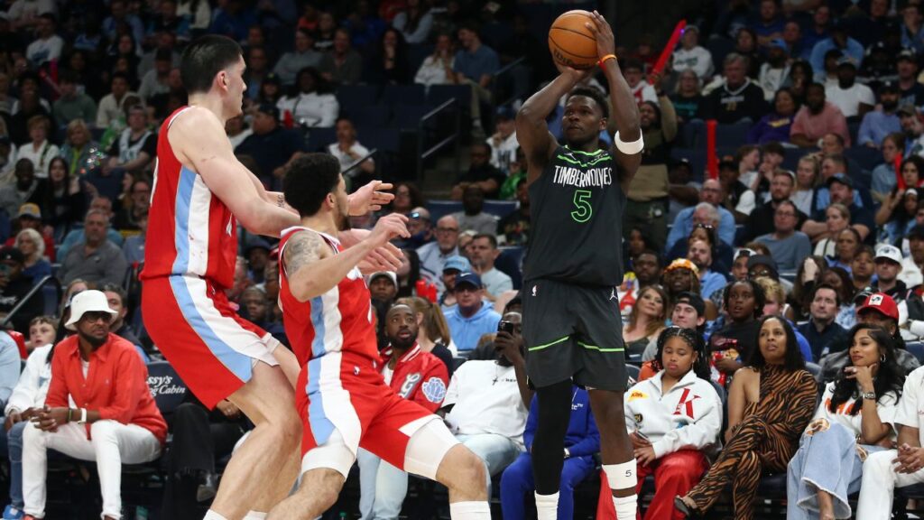 Minnesota Timberwolves guard Anthony Edwards (5) shoots for three during the fourth quarter against the Memphis Grizzlies at FedExForum.