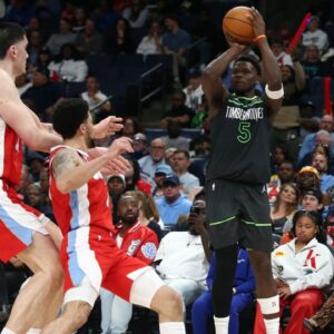 Minnesota Timberwolves guard Anthony Edwards (5) shoots for three during the fourth quarter against the Memphis Grizzlies at FedExForum.