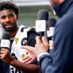 Colorado Buffaloes quarterback Shedeur Sanders (2) talks to ESPN after the University of Colorado NFL Showcase at the CU Indoor Practice Facility.