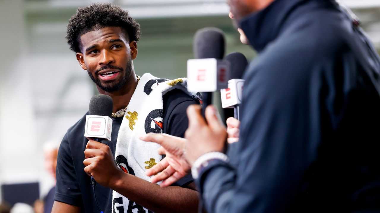 Colorado Buffaloes quarterback Shedeur Sanders (2) talks to ESPN after the University of Colorado NFL Showcase at the CU Indoor Practice Facility.