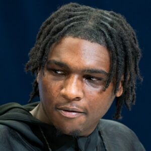 Miami quarterback Cam Ward (QB15) talks to the press during the 2025 NFL Combine at Indiana Convention Center.