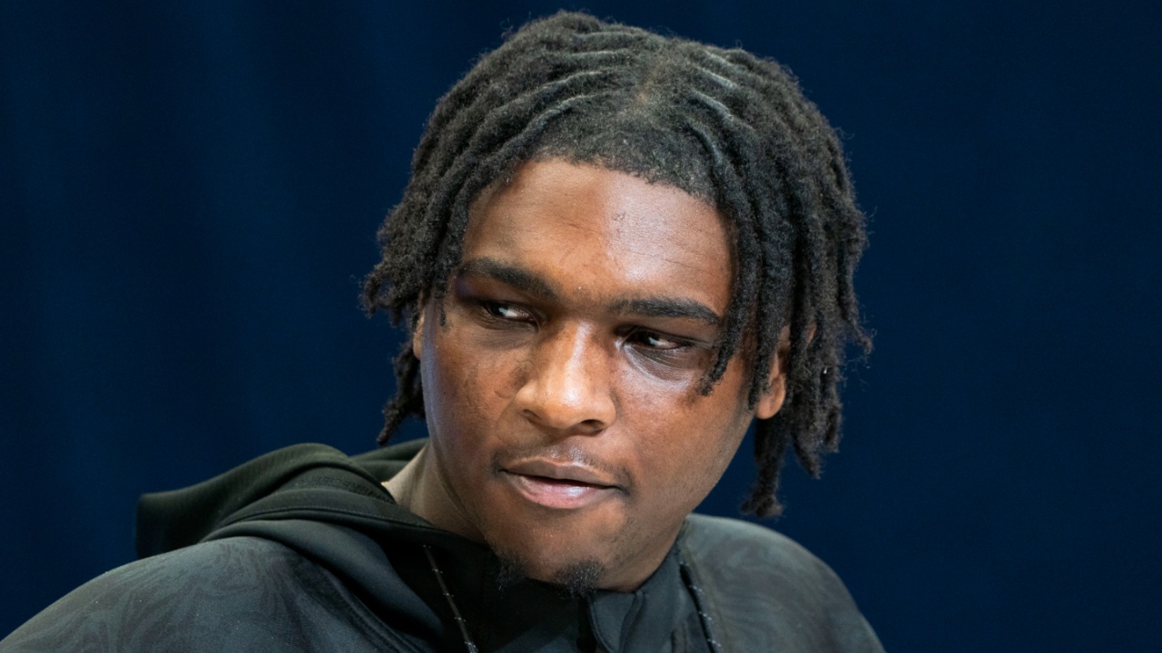 Miami quarterback Cam Ward (QB15) talks to the press during the 2025 NFL Combine at Indiana Convention Center.