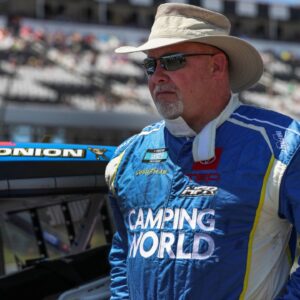 Former NASCAR Camping World Truck Series driver Todd Bodine stands on pit road prior to the CRC Brakleen 150 at Pocono Raceway. It is his 800th and final scheduled start in NASCAR national series races in his career. Mandatory Credit: Matthew OHaren-Imagn Images