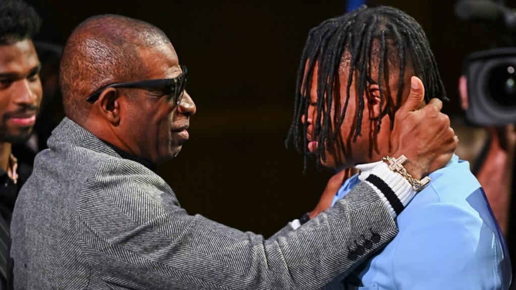 Deion Sanders and Travis Hunter