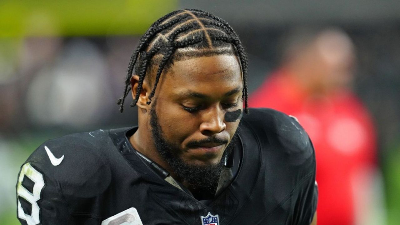 Las Vegas Raiders running back Josh Jacobs (8) walks off the field after the Raiders were defeated by the Minnesota Vikings 3-0 at Allegiant Stadium.