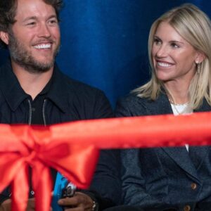 Mathew and Kelly Stafford share a laugh during speeches for the ribbon cutting of the Kelly and Matthew Stafford and Friends Education Center at the S.A.Y Detroit Play Center in Detroit on Monday, April 1, 2024.