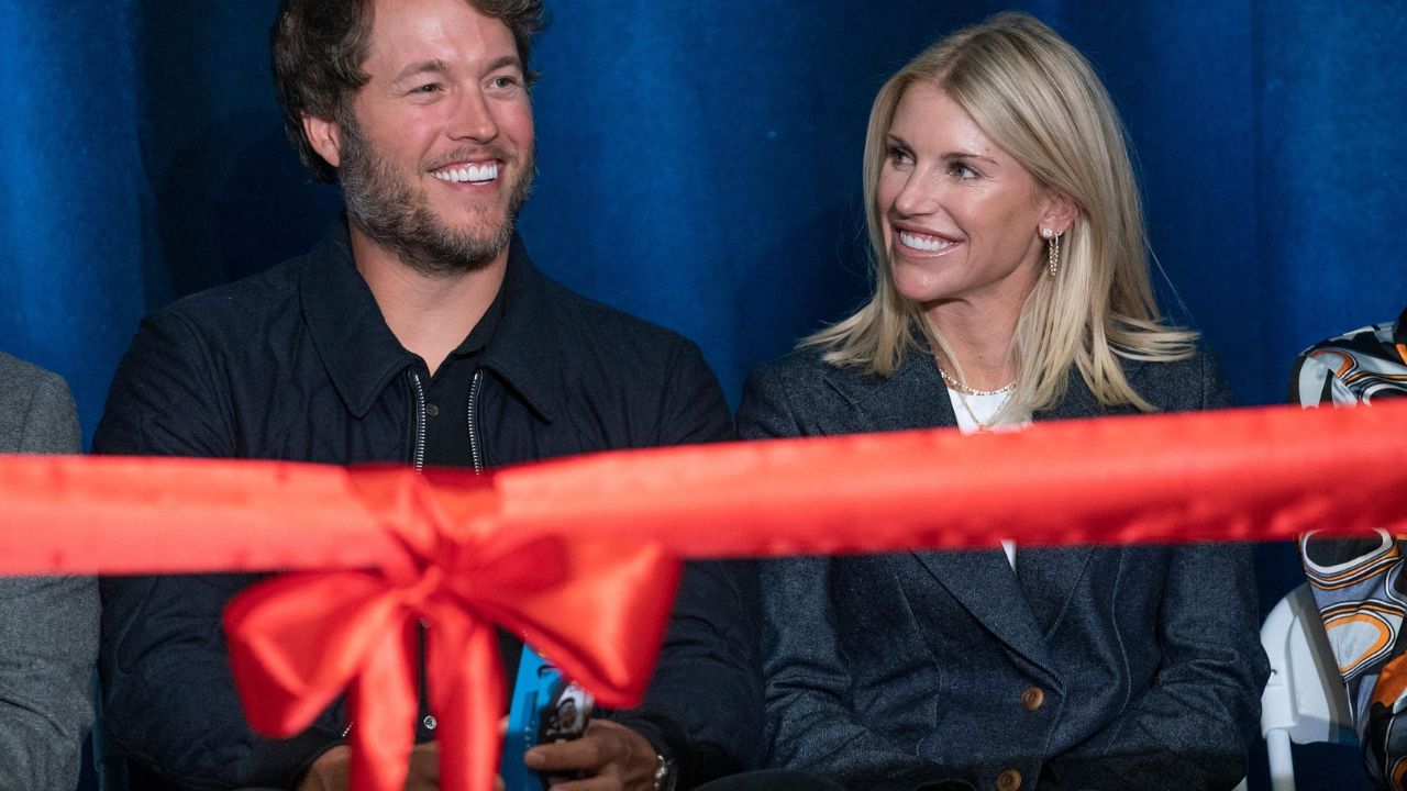 Mathew and Kelly Stafford share a laugh during speeches for the ribbon cutting of the Kelly and Matthew Stafford and Friends Education Center at the S.A.Y Detroit Play Center in Detroit on Monday, April 1, 2024.
