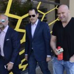 From left , UFC executives Lorenzo Fertitta, Lawrence Epstein, and Dana White, walk out of the offices of Vincent Ward,, n Downtown Albuquerque on a fact finding trip to investigate the incident involving UFC Champion Jon Jones