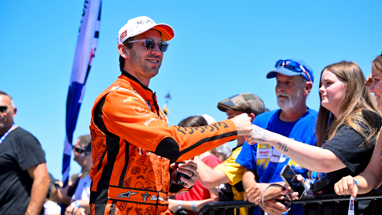 May 4, 2025; Fort Worth, Texas, USA; NASCAR Cup Series driver Daniel Suarez (99) is introduced before the start of the Wurth 400 race at Texas Motor Speedway. Mandatory Credit: Jerome Miron-Imagn Images