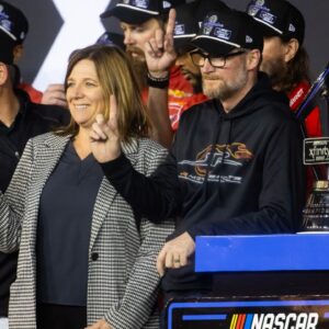 NASCAR Xfinity Series team owner Dale Earnhardt Jr and sister Kelley Earnhardt Miller celebrate after winning the 2024 Xfinity Series championship during the Championship race at Phoenix Raceway.