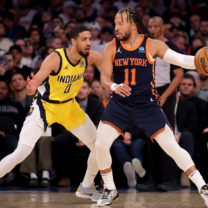 New York Knicks guard Jalen Brunson (11) controls the ball against Indiana Pacers guard Tyrese Haliburton (0) during the first quarter at Madison Square Garden