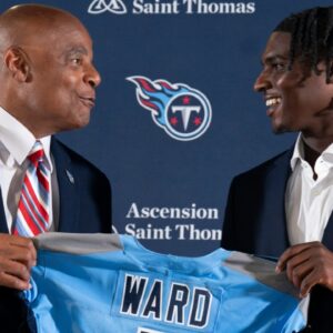 NFL Hall of Fame quarterback Warren Moon, left, poses for pictures with Cam Ward who earlier had been introduced as the Tennessee Titans first-round pick – and overall number one pick – in the NFL Draft at Ascension Saint Thomas Sports Park in Nashville, Tenn., Friday, April 25, 2025. Moon, whose No. 1 jersey is retired for the Tennessee Titans, allowed Ward to wear his number.